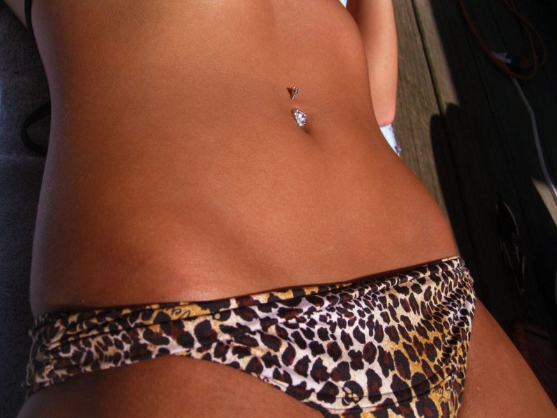 Beautiful girls with piercing navel
