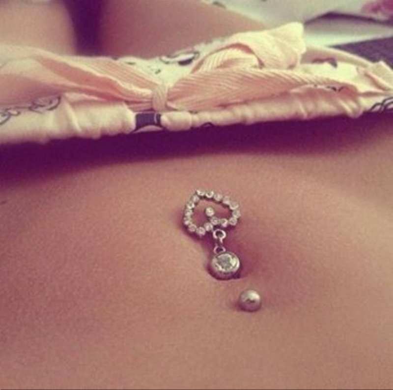 Beautiful girls with piercing navel
