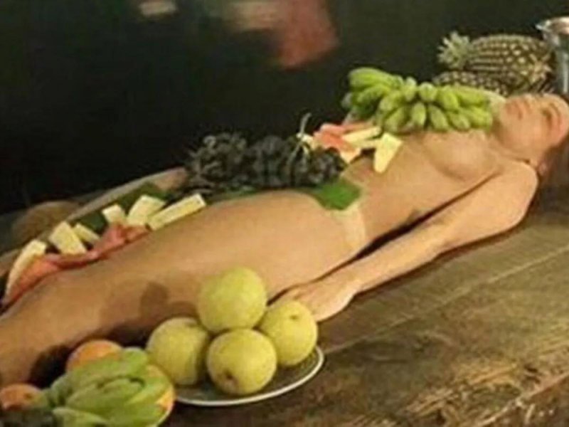Food on the body of a girl
