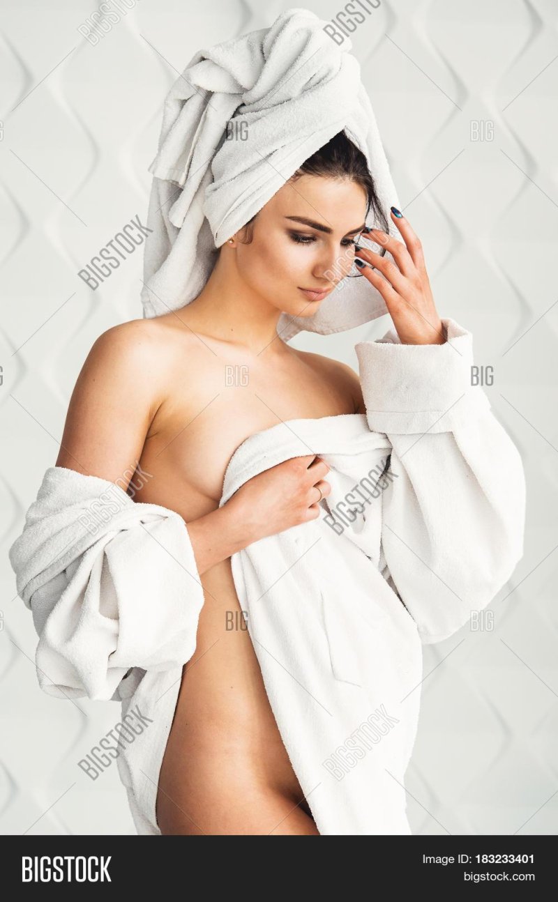Girl with a towel on the head of nude