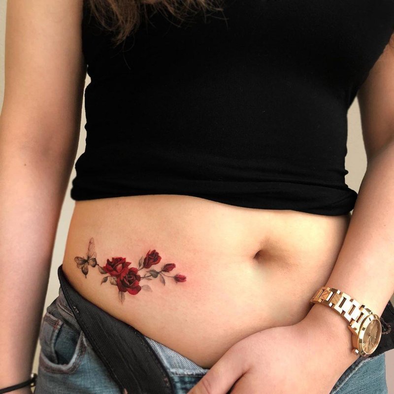 Female tattoo on the thigh