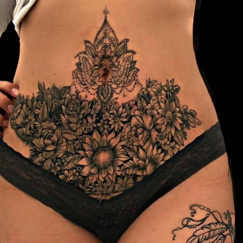 Female tattoos on the stomach