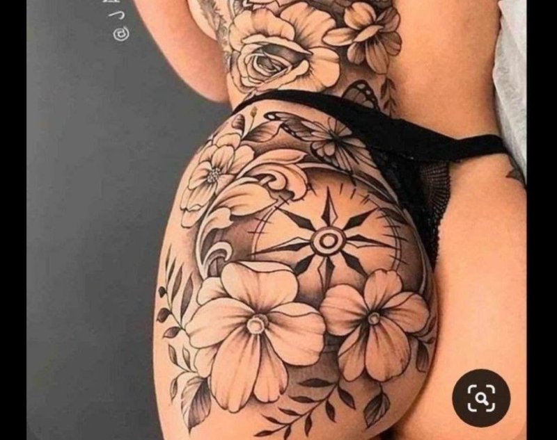 Thigh tattoo