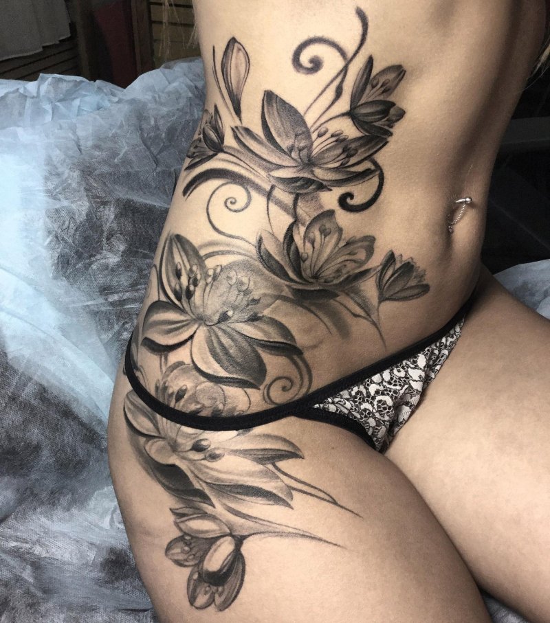Tattoo flowers on the stomach