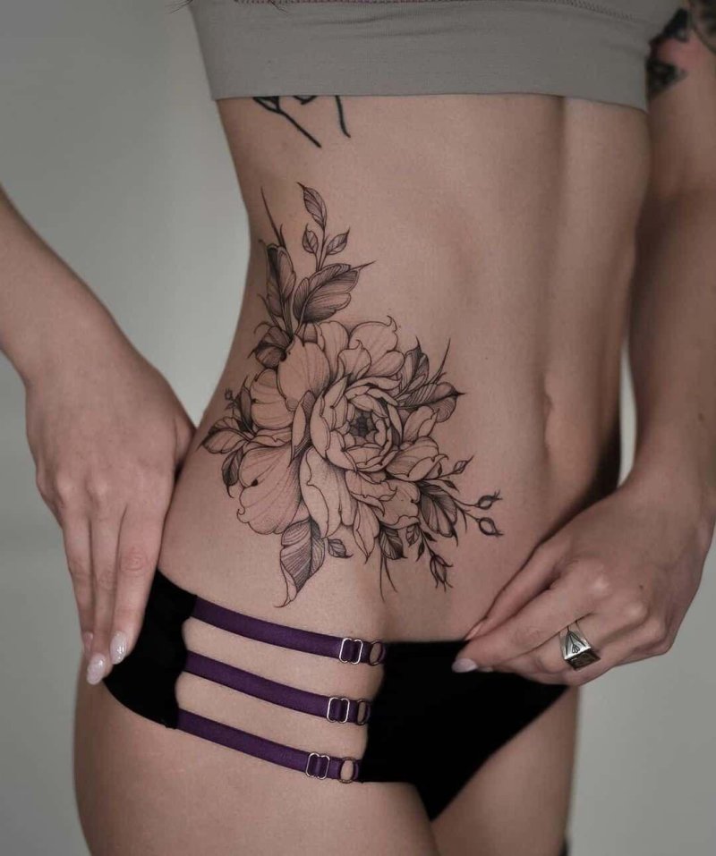 Beautiful tattoo on the stomach for girls