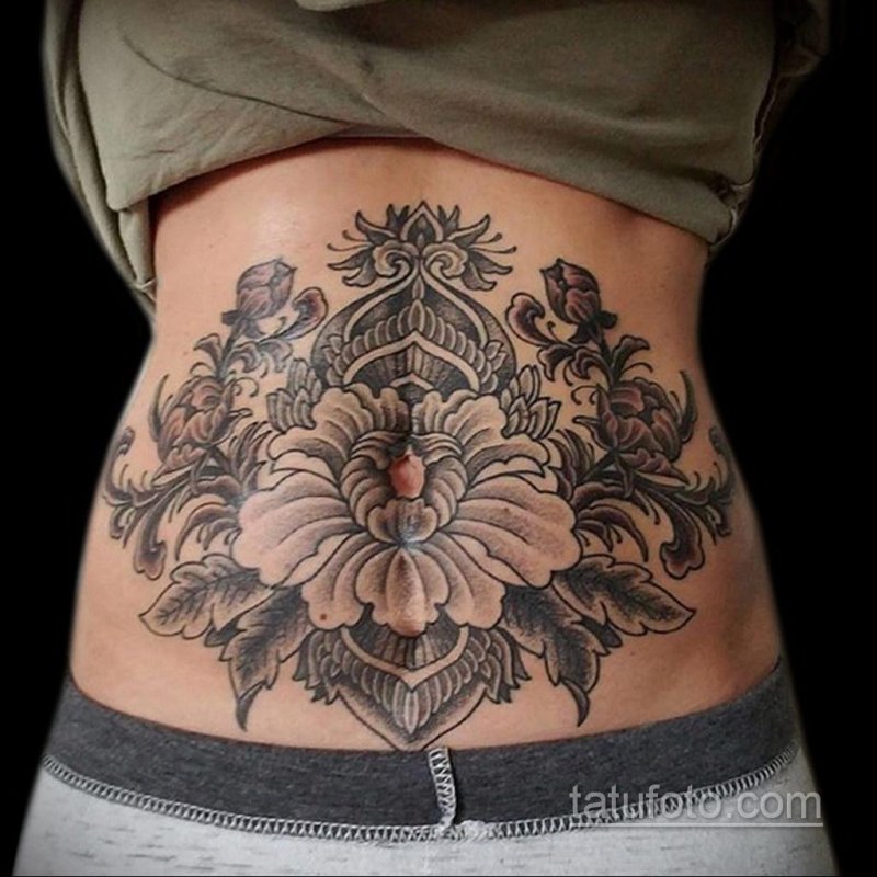 Beautiful female tattoos on the stomach