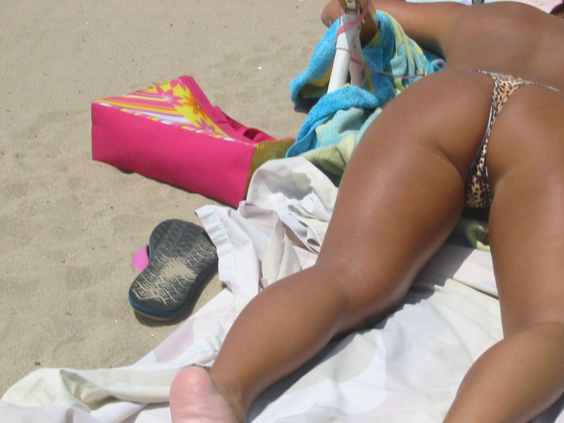 Women in thongs on the beach