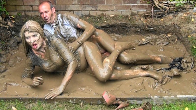 Girls are lying in mud