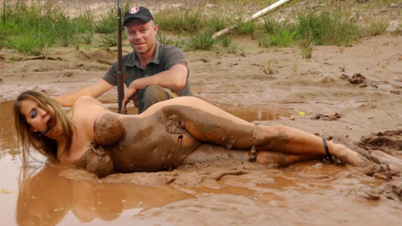 Naked women are drowning in a swamp