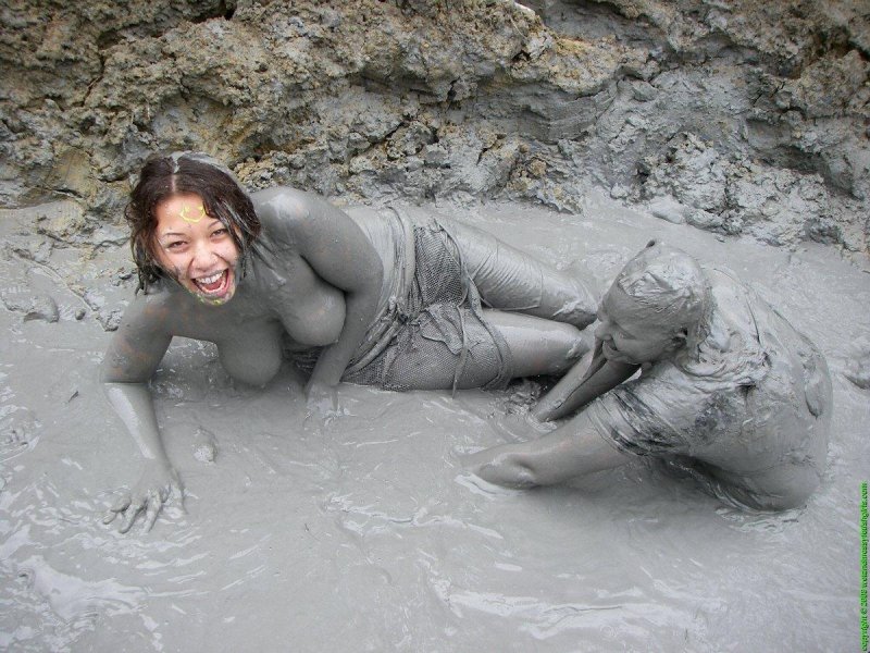 Mud bathing naked