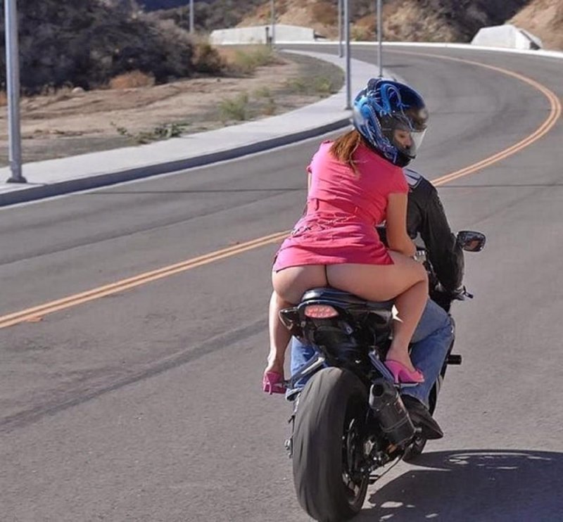 Girl on a motorcycle without panties