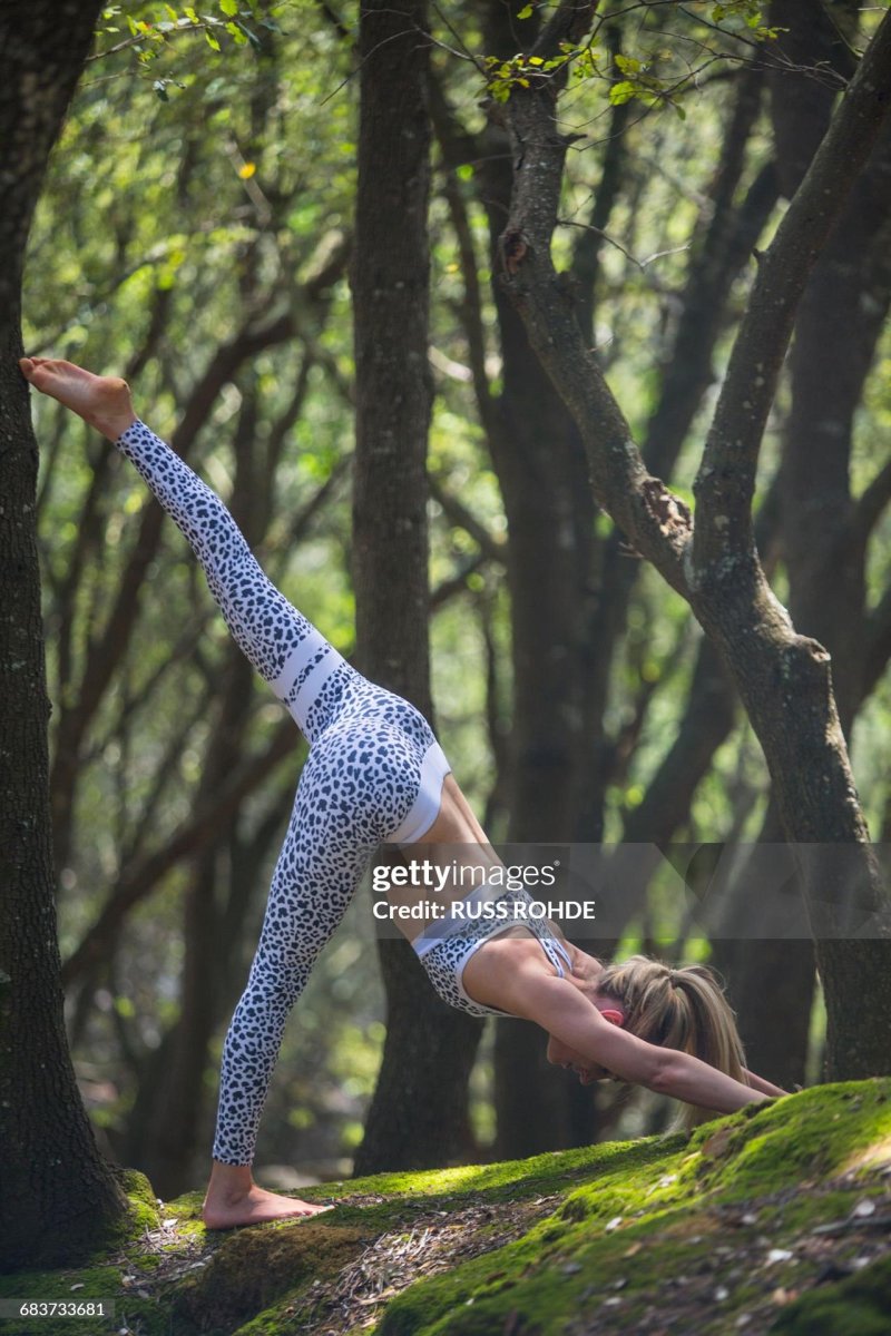 A woman is engaged in yoga