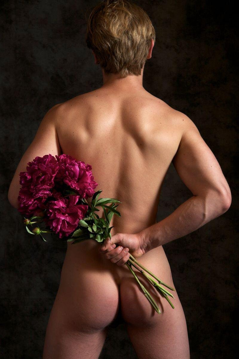 Naked men with flowers