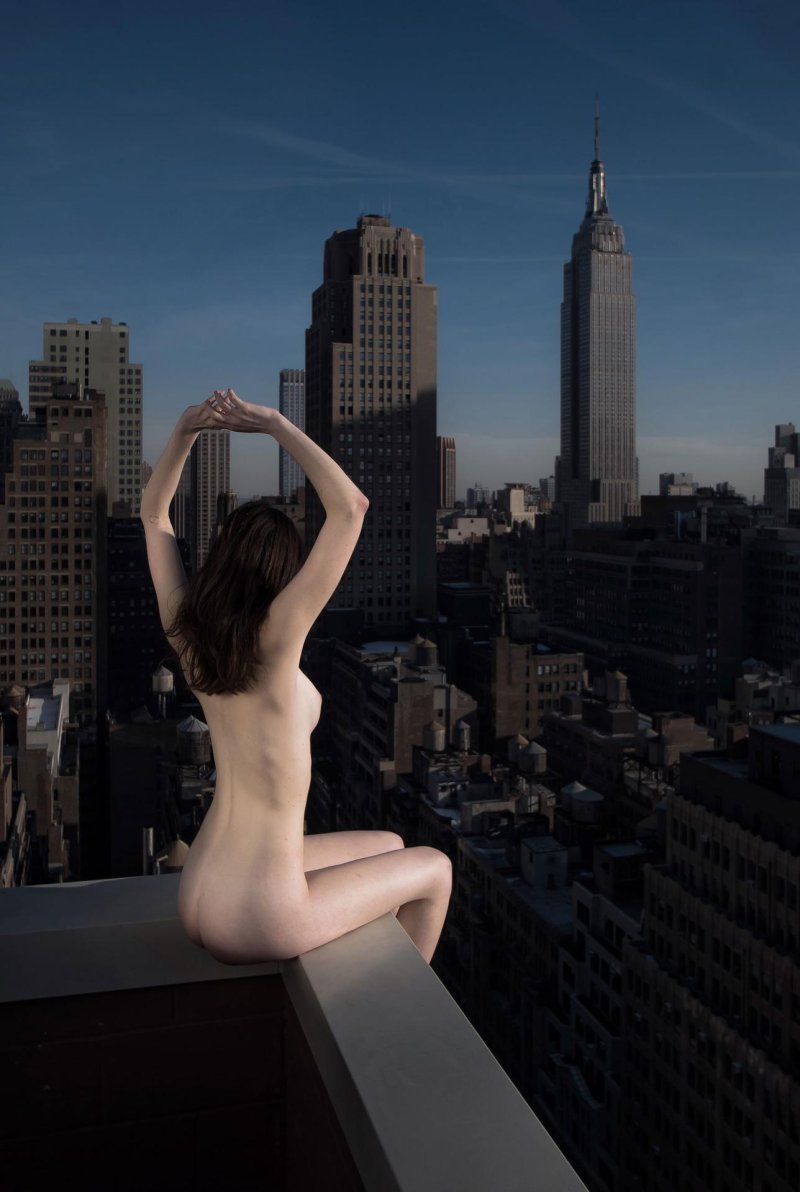 The girl undressed on roof