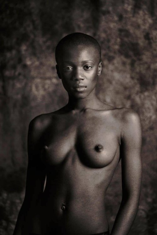 Naked bald black woman