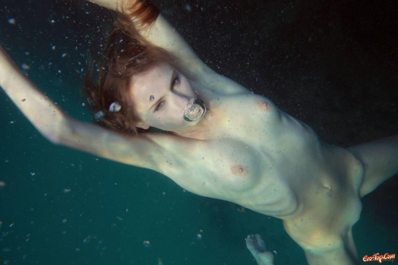 Naked girl under water