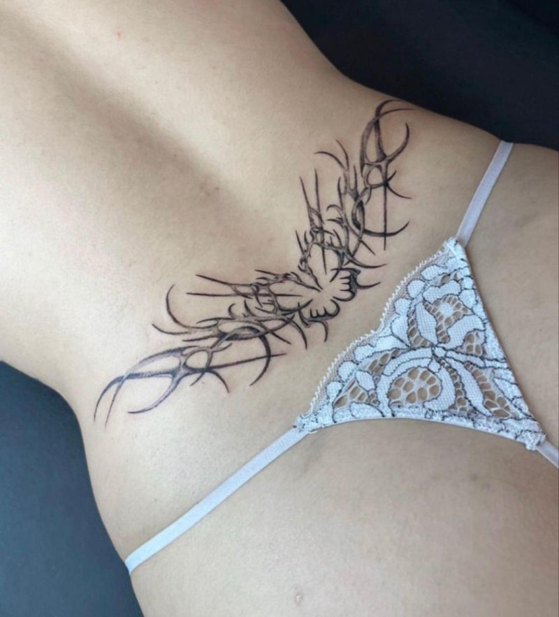 Female tattoo on the back