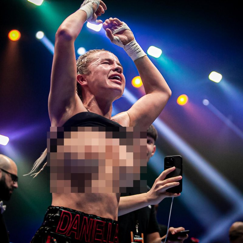 With naked breasts