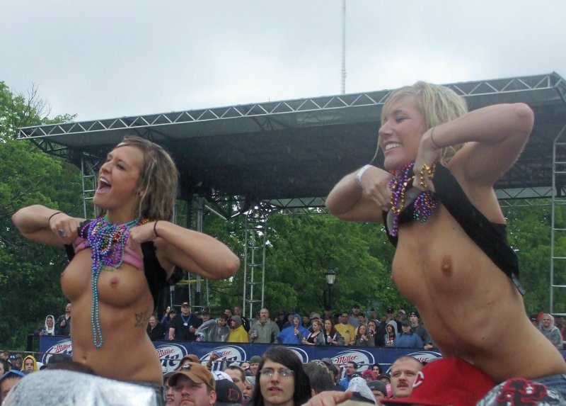 Shine with boobs at a concert