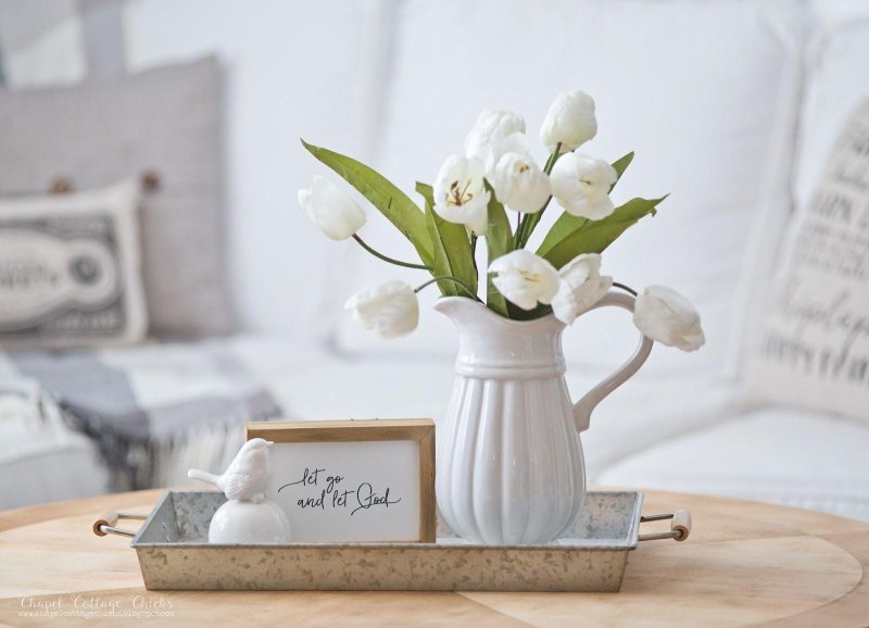 Vase with white tulips