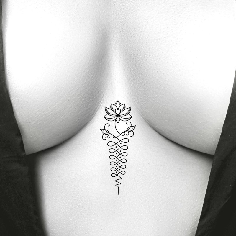 Unalome Lotus between the sternum of tattoo