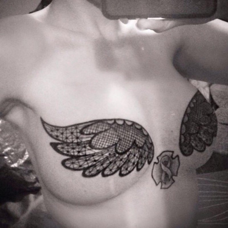 Tattoo for girls under the chest