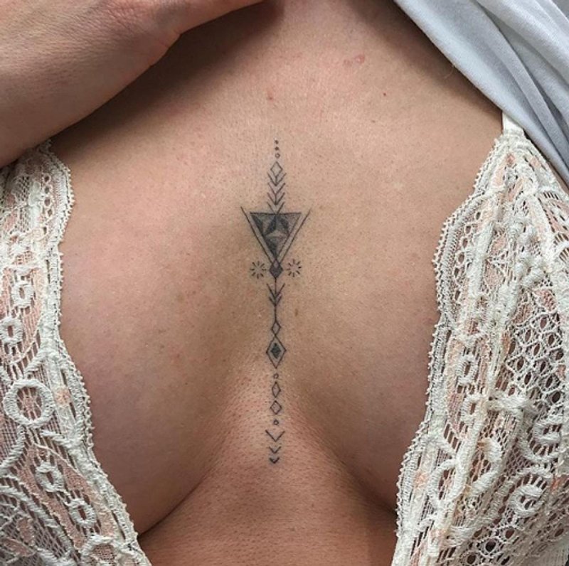 Tattoo between the infants in girls