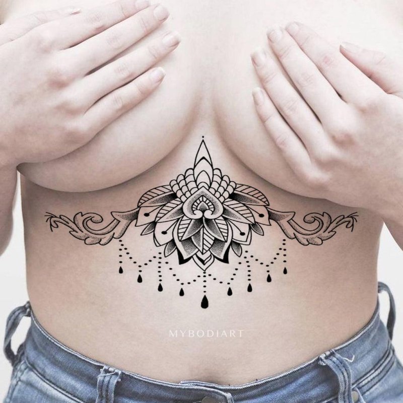 Tattoo chandelier under the chest