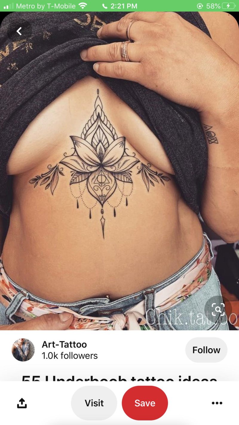 Under the chest tattoo