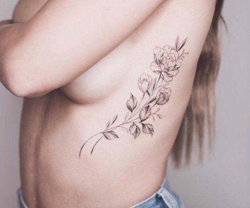 Beautiful tattoos on the ribs