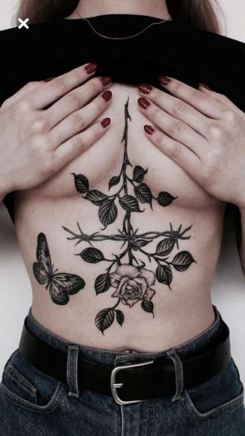 Color tattoo under the chest