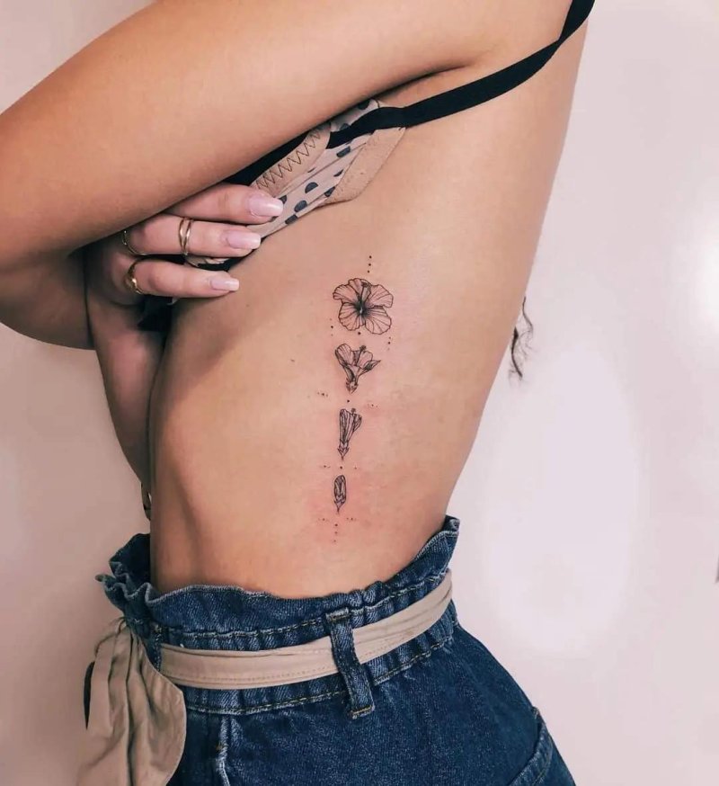 Tattoo on ribs for girls