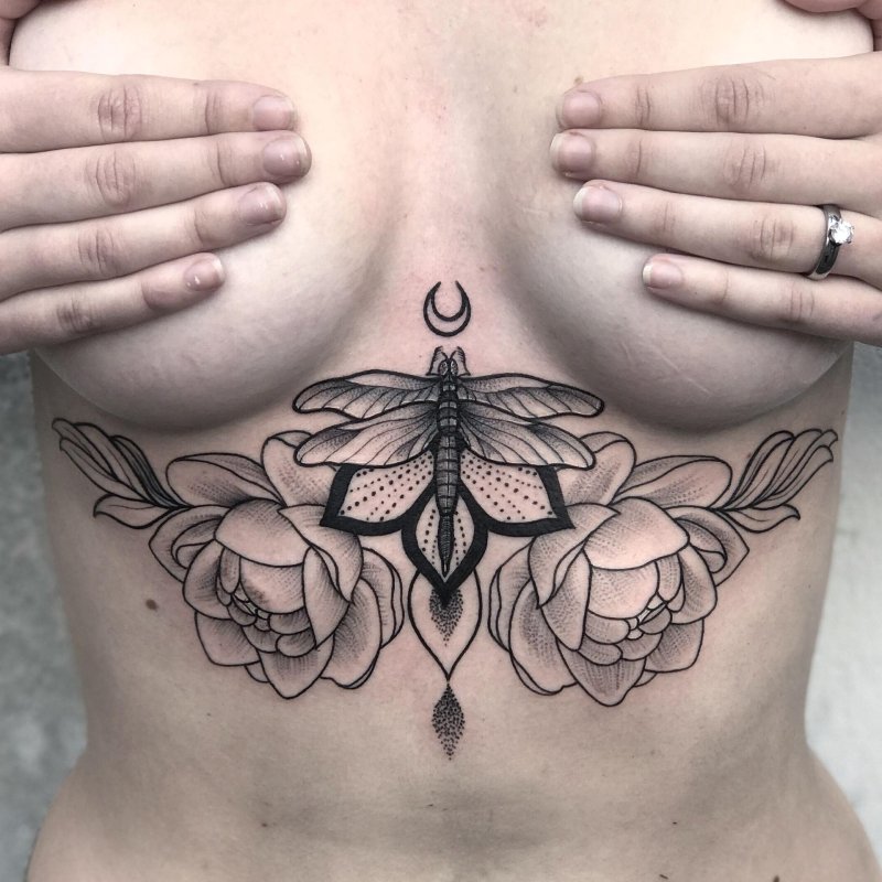 Tattoo under the sternum of girls