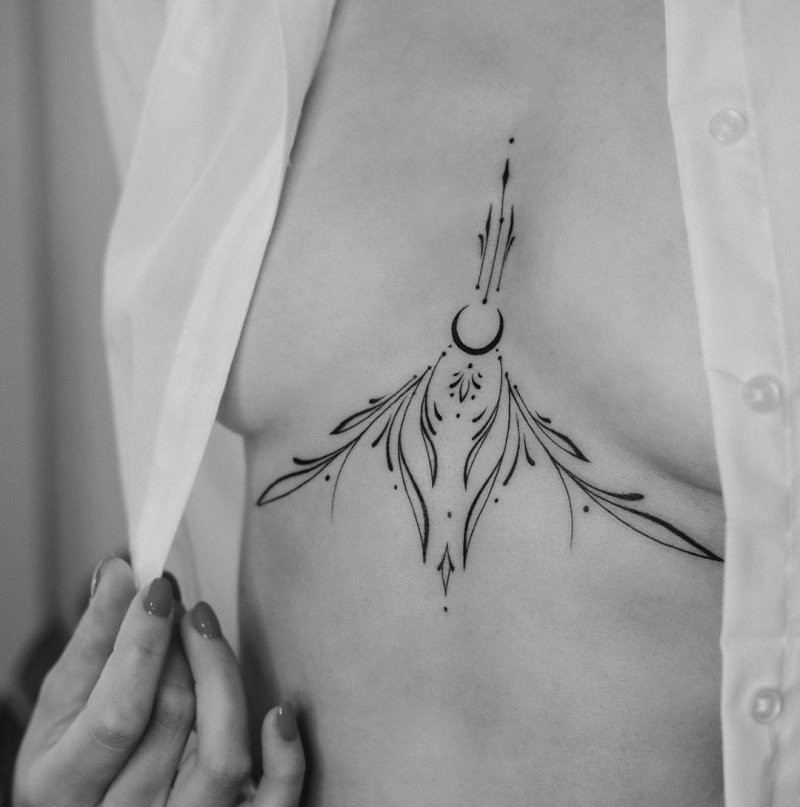 Tattoos for girls under the chest