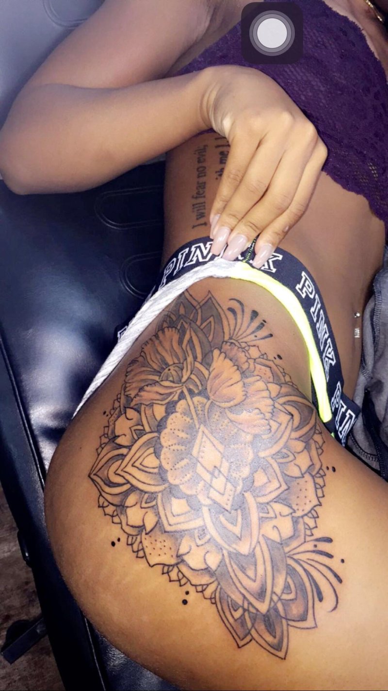 Beautiful tattoo on the hip