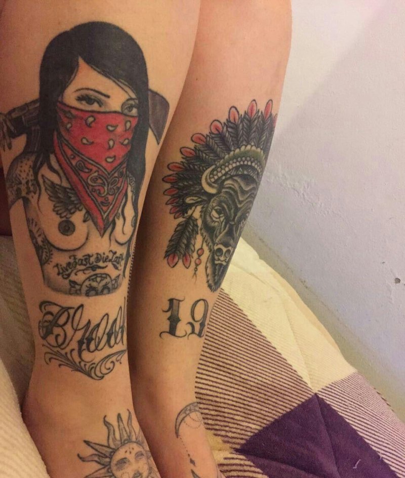Tattoo girl with a bandana on her face