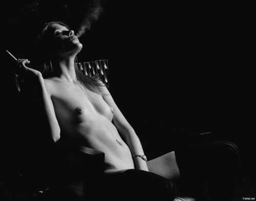 Naked girl with a cigarette