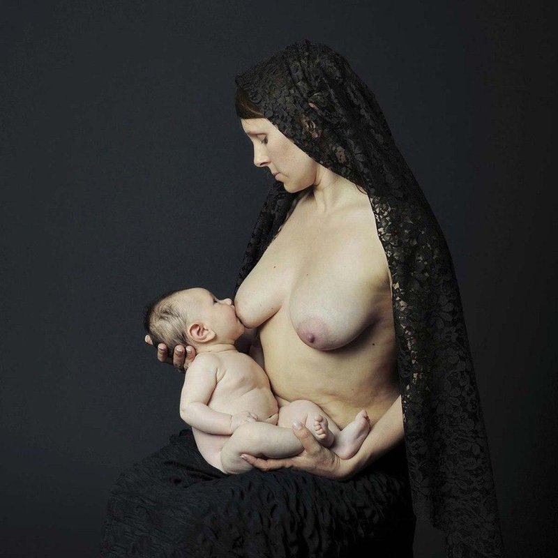 Naked woman with a baby