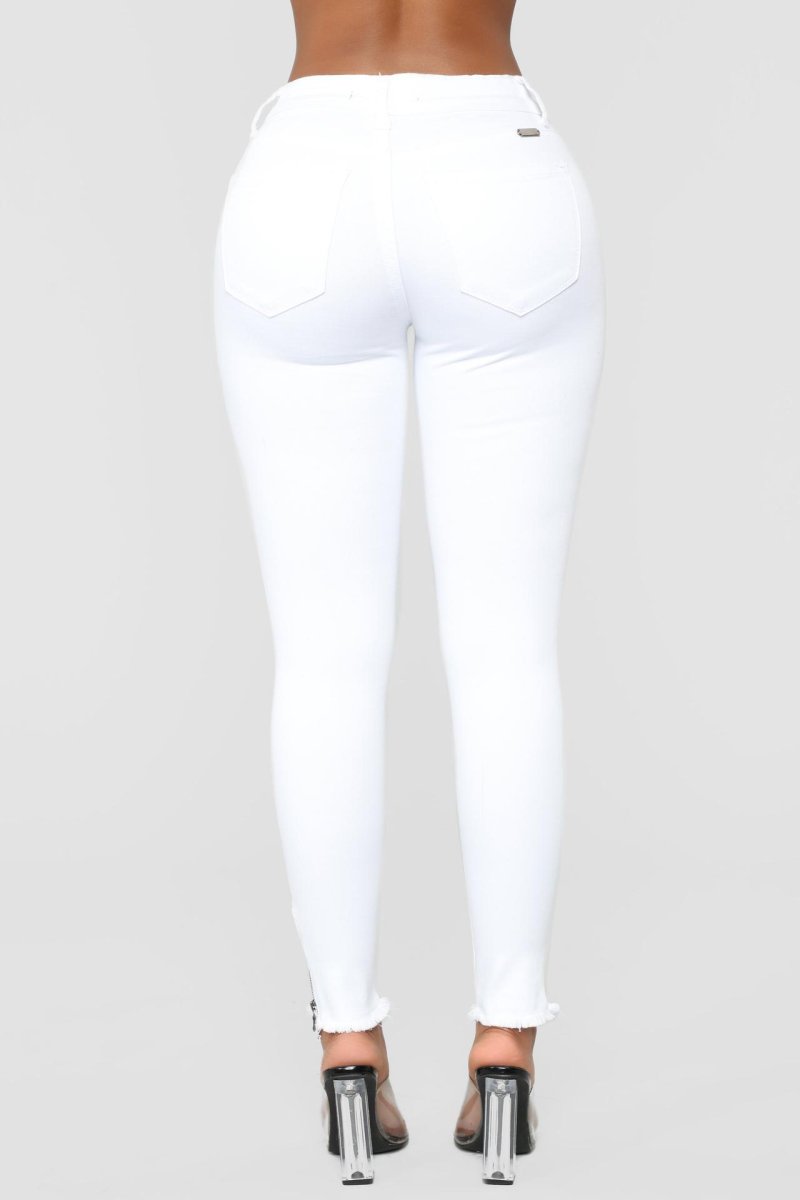 White torn jeans