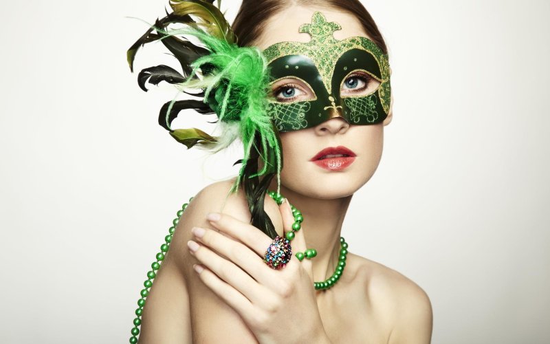 Woman in a green mask