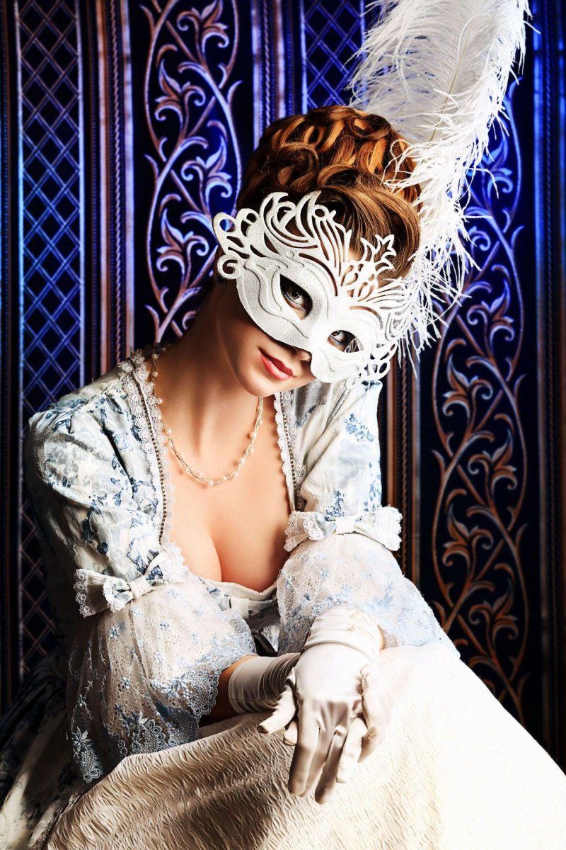 Girl in a masquerade mask