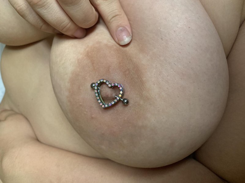 Piercing nipples of hearts