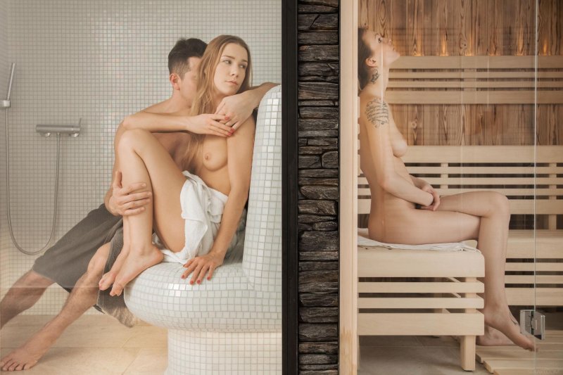 Naked men and women in the bathhouse