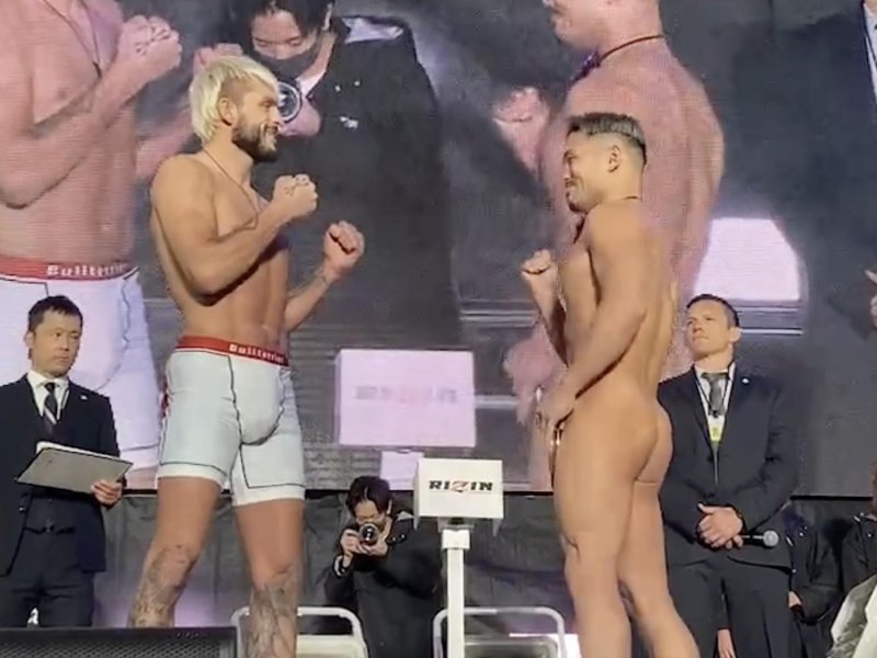 Naked fighter on weighing