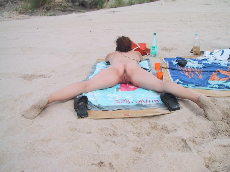 Drunk naked women on the beach