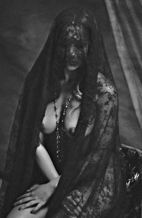 Woman under the veil naked
