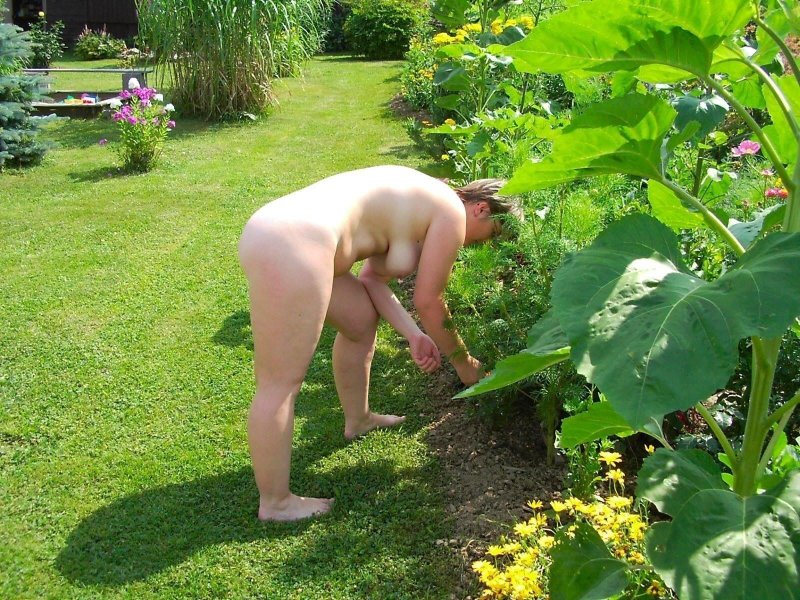 Naked women on the beds of garden