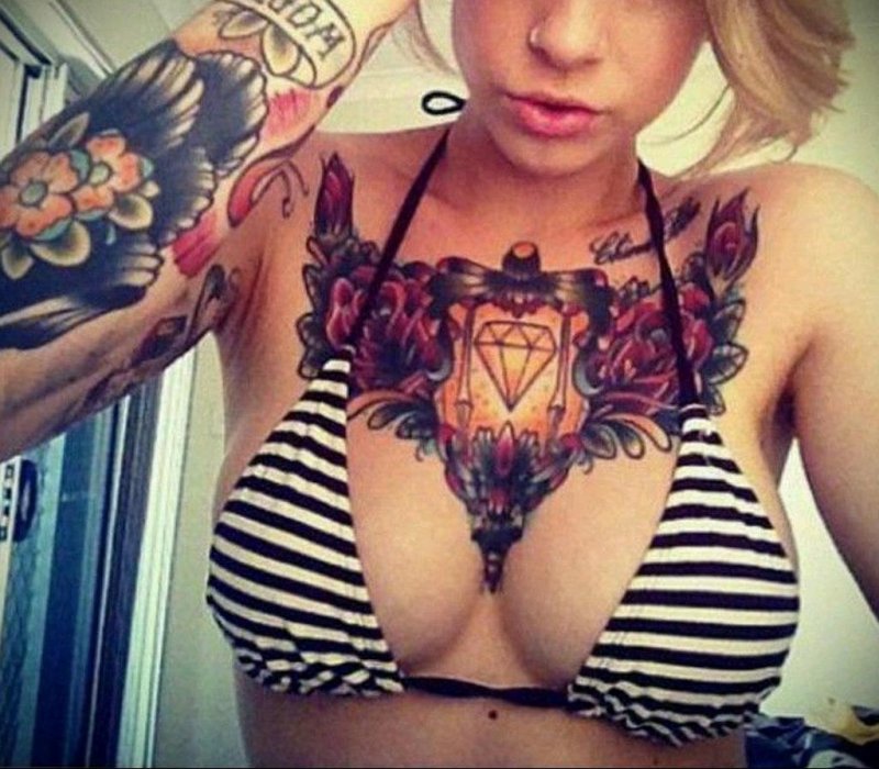 On the chest tattoo