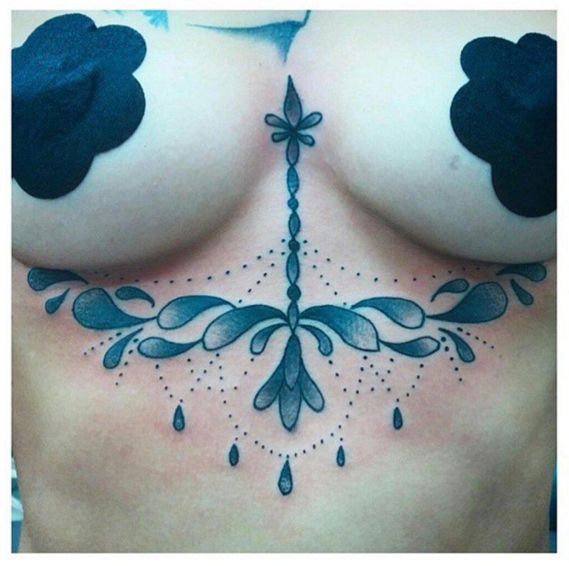 Tattoo on the female breast and nipples