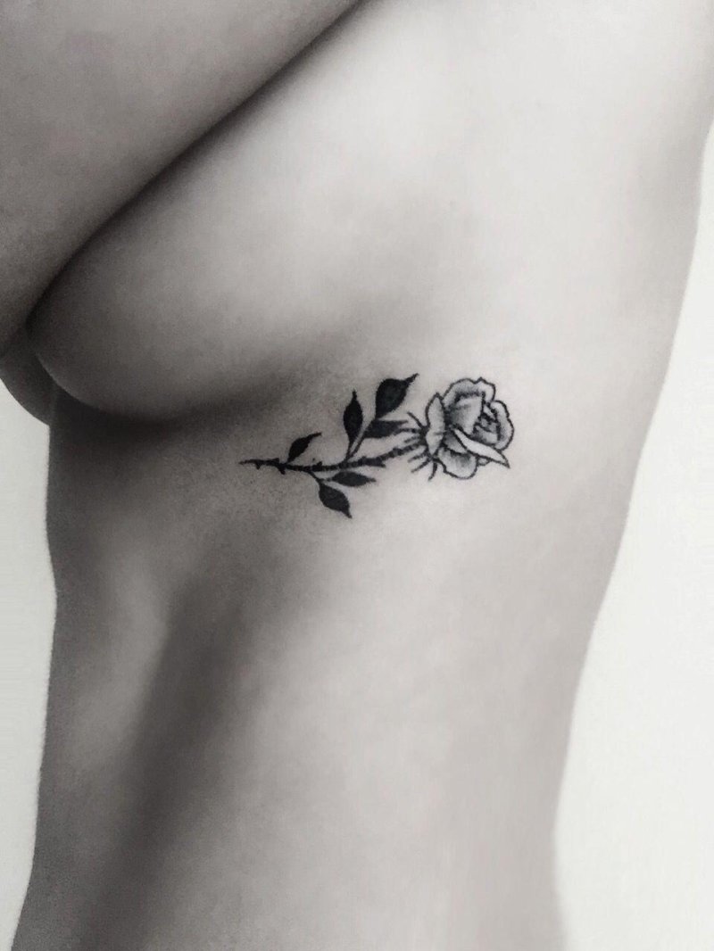 Mini tattoo under the chest